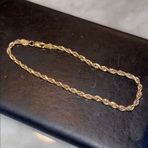 10 Ct Yellow gold rope chain bracelet.
